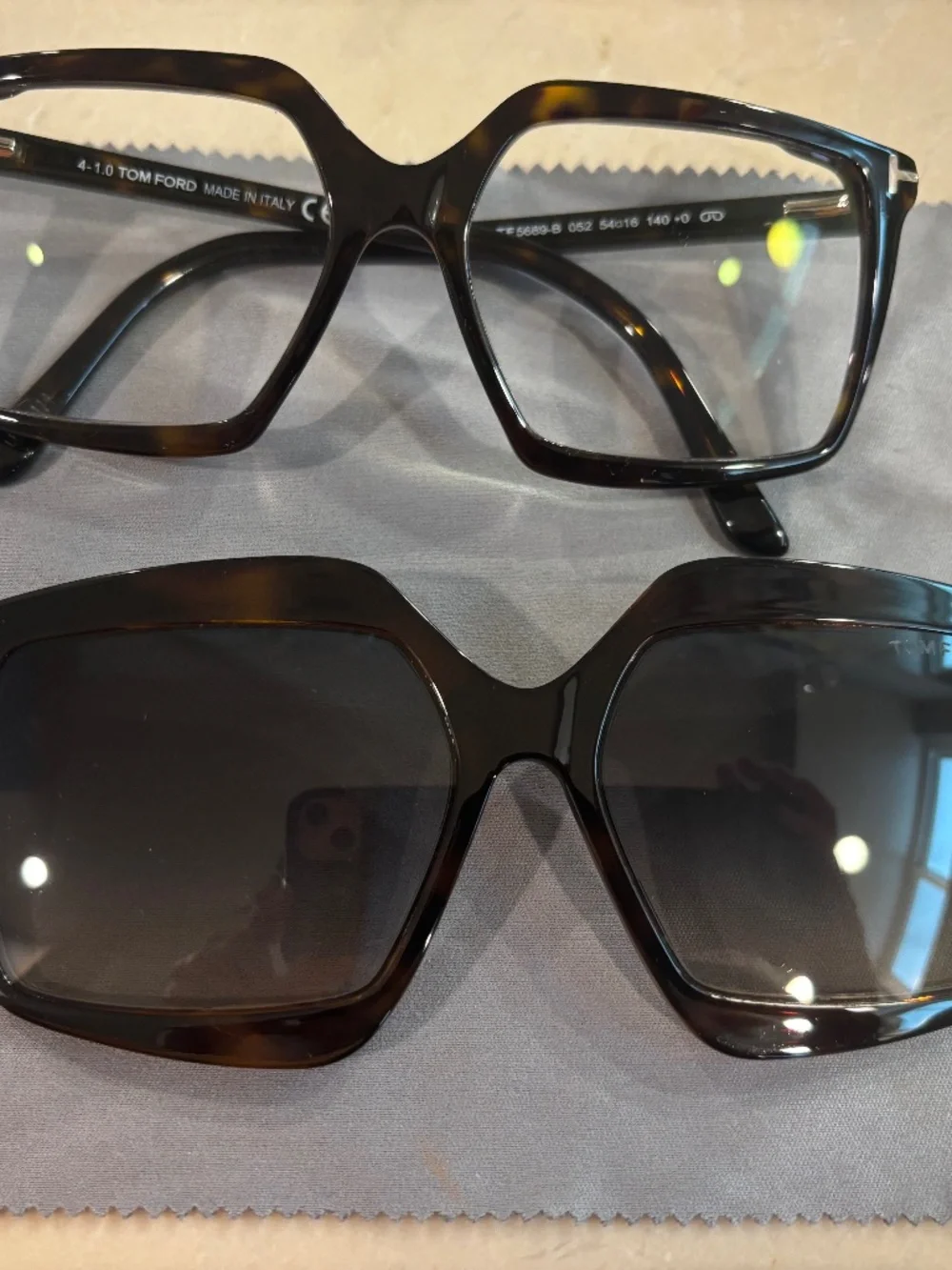 Lot of used Prada and Tom Ford glasses.